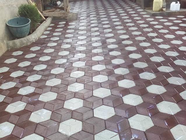 Two-tone cabro paving blocks laid in a diamond pattern by Kellyscappers Central